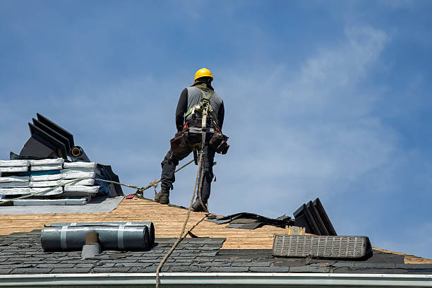 Professional Gutter Installation technician working in Tahlequah, OK